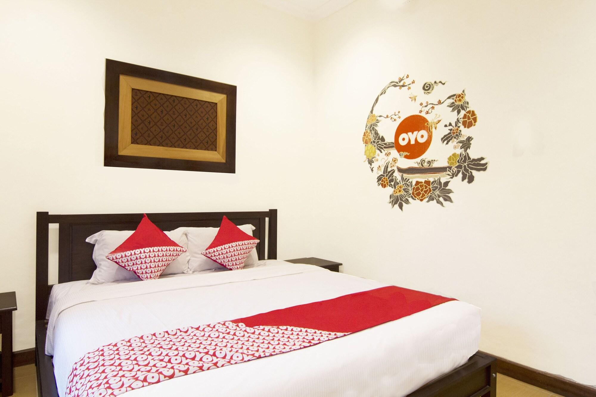 OYO 261 Sasono Putro Guest House Kejayan Esterno foto